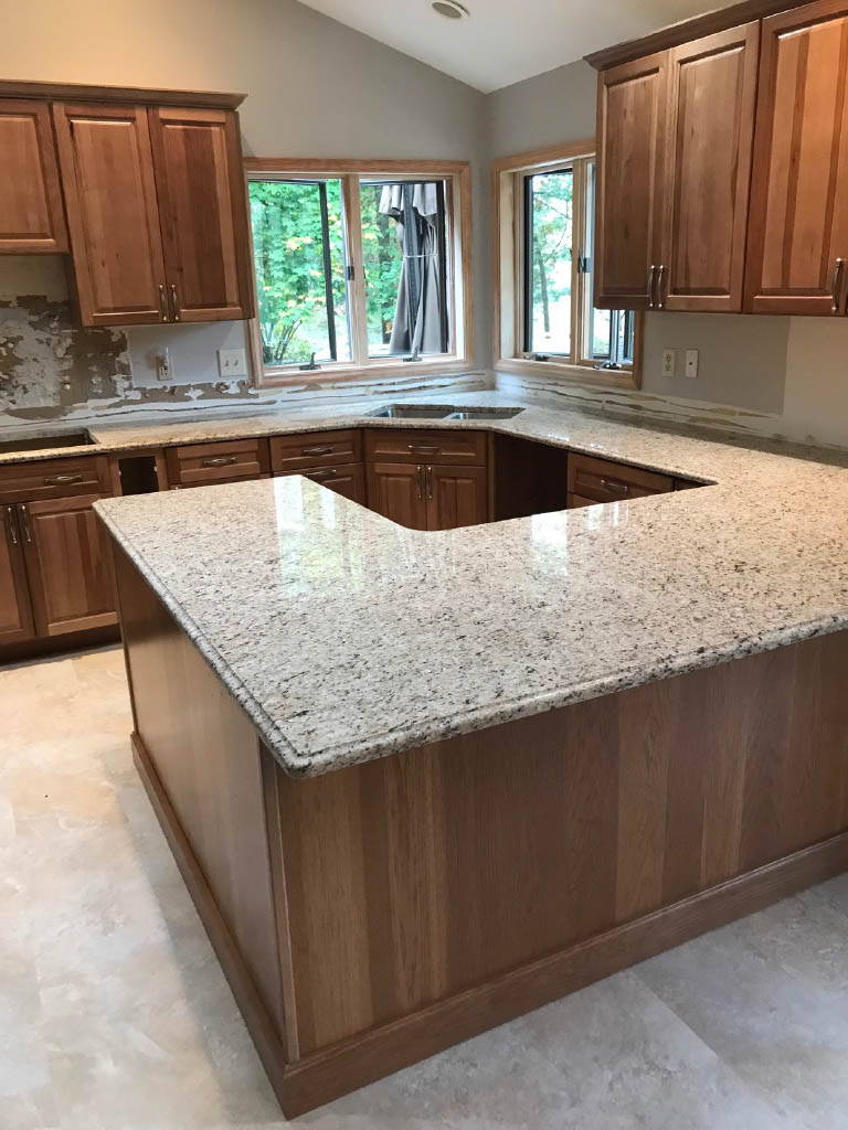 White countertops in a warm kitchen