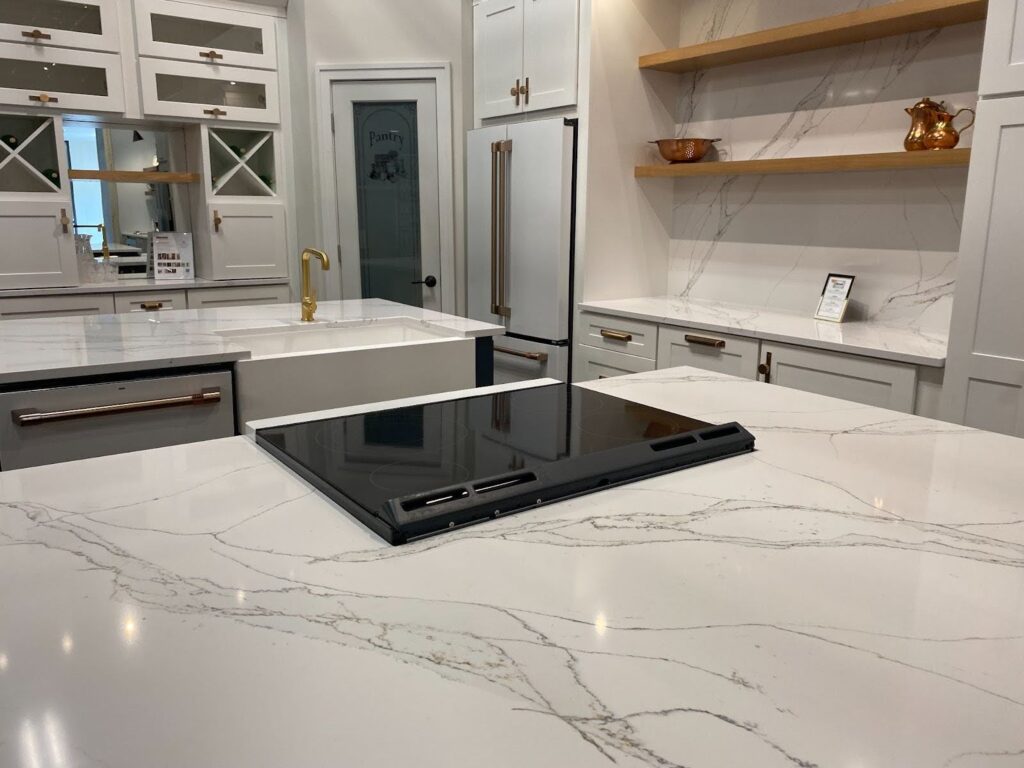 A white quartz countertop with veining